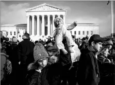  ?? DAMON WINTER / THE NEW YORK TIMES FILE (2019) ?? People gather in front of the Supreme Court on Jan. 18, 2019, during the March for Life.