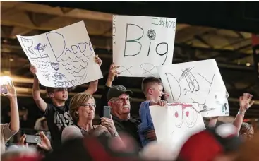  ?? Elizabeth Conley / Houston Chronicle ?? Darrell Ocamica’s family shows their support during the Bassmaster Classic weigh-in at Minute Maid Park.