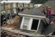  ?? L.A. PARKER — THE TRENTONIAN ?? Crews search for survivors in a collapsed building on Broad St in Hamilton.