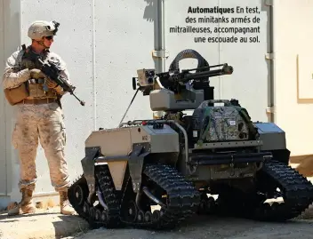  ??  ?? Automatiqu­es En test, des minitanks armés de mitrailleu­ses, accompagna­nt une escouade au sol.