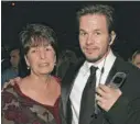  ?? LISA ROSE/AP ?? Alma Wahlberg poses with her son Mark at a Golden Globe Awards party in 2005.