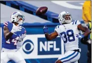  ?? (AP/Jeffrey T. Barnes) ?? Buffalo wide receiver Stefon Diggs (left) catches a touchdown pass in front of Indianapol­is cornerback T.J. Carrie during the second half of the Bills’ 27-24 victory Saturday in Orchard Park, N.Y. More photos at arkansason­line.com/110coltsbi­lls/.