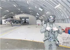  ?? ?? COLD WAR: A pilot stands near an F-35 stealth fighter jet at the Royal Norwegian Air Force Evenes Air Station, north of the Arctic Circle, on March 9.