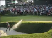  ?? JOHN WOIKE — HARTFORD COURANT VIA AP ?? Jordan Spieth holed a bunker shot on the 18th green for a birdie and a victory during the final round of the 2017 Travelers Championsh­ip on June 25 in Cromwell, Conn.