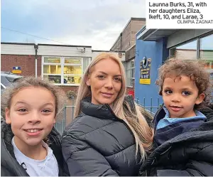  ?? OLIMPIA ZAGNAT ?? Launna Burks, 31, with her daughters Eliza, lkeft, 10, and Larae, 3