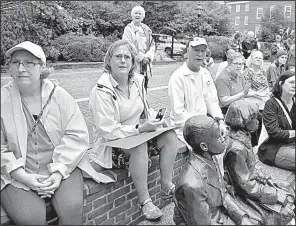  ?? AP/The Baltimore Sun/MATTHEW COLE ?? People in Annapolis, Md., listen to speakers Saturday during the Annapolis Rally for Healthcare at Lawyer’s Mall.