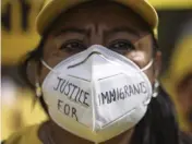  ?? KEVIN DIETSCH TNS ?? An immigratio­n activist participat­es in a rally near the White House on Oct. 7, 2021, in Washington, D.C.