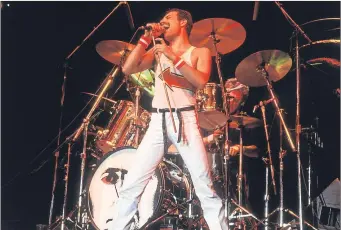  ??  ?? Freddie performing with Queen in 1982