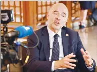  ?? ( AFP) ?? European Commission­er for Economic Affairs Pierre Moscovici talks to AFP on the sidelines of the Internatio­nal Monetary Fund (IMF) and World Bank annual meetings in Nusa Dua on Indonesia’s resort island of Bali on Oct 11. The EU wants to avoid a ‘crisis’ with Italy over the country’s spending plans, however Brussels also needs to ensure the eurozone economy remains stable, Moscovicis­aid.