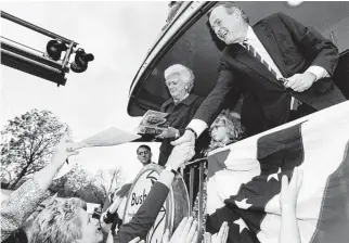  ?? Brett Coomer / Staff photograph­er ?? Former President George H.W. Bush and wife Barbara made a stop in Old Town Spring on Nov. 30, 1994, on their way to College Station for the groundbrea­king of Bush’s presidenti­al library.