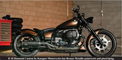  ?? ?? R 18 Diamond Custom by Konquer Motorcycle­s has Bronze Metallic paintwork and pinstripin­g.