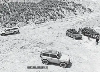  ?? POSTMEDIA ?? Leaked images show the Bronco and Bronco Sport staged for some fun in the sand.