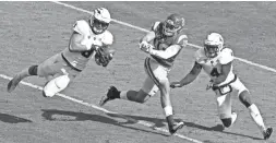  ?? KEITH BIRMINGHAM/AP ?? ASU linebacker Merlin Robertson intercepts a pass intended for USC tight end Jake Ray on Saturday.