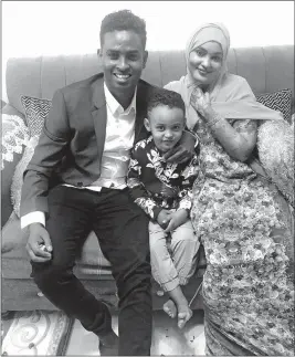  ?? [FAMILY PHOTO] ?? Afkab Hussein traveled to Kenya in 2019 to visit his wife, Rhodo, and 4-year-old son Abdullahi. Rhodo gave birth to the couple’s second son last month.