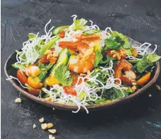  ??  ?? Prawn and crispy rice noodle salad.