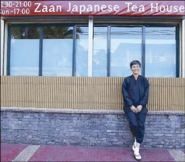  ?? REUTERS ?? Photo taken last Feb. 12 shows Noriko Iwamoto posing outside her restaurant in Quezon City.