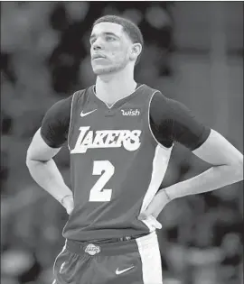  ?? Carlos Osorsio Associated Press ?? BEFORE LONZO BALL had knee surgery July 17, Lakers general manager Rob Pelinka expected the point guard to be “100% ready” for training camp.