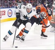  ??  ?? The Sharks’ Timo Meier (28) is chased by Edmonton’s Oscar Klefbom (77) during San Jose’s Monday night loss.