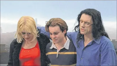  ?? CP PHOTO ?? In this film publicity image released by Chloe Production­s/TPW Films, Juliette Danielle, left, Philip Haldiman, centre, and Tommy Wiseau are shown in a scene from “The Room.”