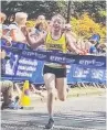  ??  ?? Freya Murdoch winning the EMF 2km