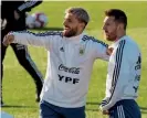  ??  ?? Argentina mates…Aguero and Messi