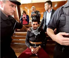  ?? — Reuters photo ?? Krasimirov during his first appearance in court in Ruse.