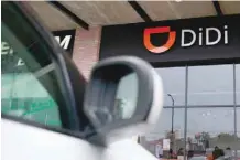  ?? — Reuters file photo ?? The logo of Chinese ride-hailing firm Didi Chuxing is seen at their new drivers centre in Toluca, Mexico.