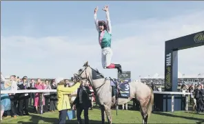  ?? PICTURE: GEORGE WOOD/GETTY IMAGES. ?? TIMELY BOOST: Jockey Frankie Dettori performs his traditiona­l celebrator­y leap after winning last year’s St Leger at Doncaster on Logician.