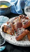  ?? MANJA WACHSMUTH ?? Clockwise from above: Sachie’s fivespice chicken nibbles, grilled tandoori prawns on skewers, ham, gruyere &amp; mustard pull-apart bread.