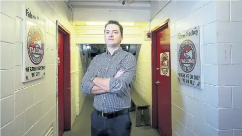  ?? JULIE JOCSAK/POSTMEDIA NEWS ?? Dan Fitzgerald, the new coach of the St. Catharines Falcons, is photograph­ed by the team's dressing rooms at the Jack Gatecliff Arena in St. Catharines on Thursday.