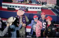  ?? — Jabin Botsford/The Washington Post ?? Supporters wait for former president Donald Trump to speak Saturday at a campaign rally in Manchester, N.H.