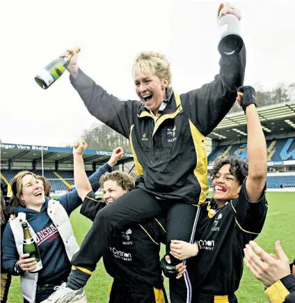  ??  ?? Uplifting: Wasps Ladies manager Giselle Mather celebrates winning the National Division One title in 2003