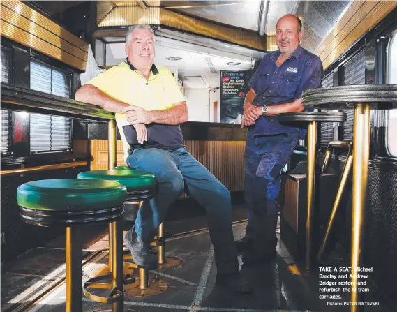  ?? Picture: PETER RISTEVSKI ?? TAKE A SEAT: Michael Barclay and Andrew Bridger restore and refurbish the Q train carriages.