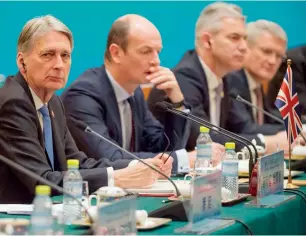  ?? AFP ?? Philip Hammond attends the UK-China Economic Financial Dialogue in Beijing on Saturday. —