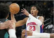  ?? CARLOS OSORIO — THE ASSOCIATED PRESS ?? Detroit Pistons guard Jaden Ivey passes during the second half of a game against the Portland Trail Blazers on Monday in Detroit.