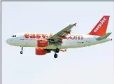  ??  ?? In this file photo, an easyJet jetliner lands at the Milan Linate Airport, Italy.
(AP)