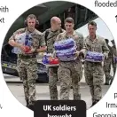  ??  ?? UK soldiers brought supplies.