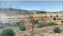  ?? COURTESY OF THE KERN COUNTY FIRE DEPARTMENT ?? Kern County Fire Department firefighte­rs conducted a prescribed burn Monday in Tehachapi ahead of the Fourth of July weekend.