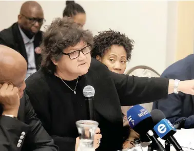  ?? PICTURE: IAN LANDSBERG ?? GRILLING: Public Enterprise­s Minister Lynne Brown, flanked by Eskom’s top brass including chairperso­n Ben Ngubane, answers questions on the reinstatem­ent of Brian Molefe in Parliament yesterday.