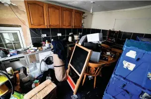  ??  ?? The kitchen where the Taits say they first heard the strange noises.