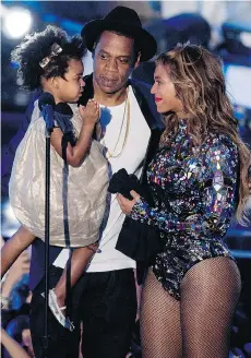  ?? MARK DAVIS/GETTY IMAGES FILES ?? Jay Z and Beyonce named their daughter Blue Ivy Carter. Consultant­s charge thousands of dollars to come up with unique baby names.