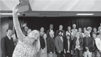  ??  ?? Environmen­t Minister Catherine McKenna takes a selfie with fellow members of the federal cabinet on Sunday in Sudbury, Ont. McKenna found herself the focus of scrutiny Tuesday for a $6,600 photograph­y contract to document last year’s COP21...