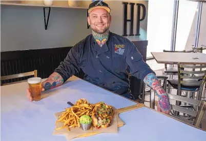  ?? ADOLPHE PIERRE-LOUIS/JOURNAL ?? High Point Grill & Taproom Chef and Owner Mike White continues to run two businesses while giving back to the community.