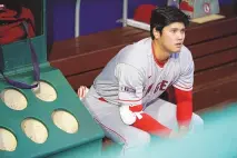  ?? MATT SLOCUM / ASSOCIATED PRESS ?? The Los Angeles Angels’ Shohei Ohtani sits in the dugout prior to Tuesday’s game against the Philadelph­ia Phillies in Philadelph­ia.