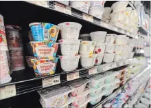  ?? GERALD HERBERT THE ASSOCIATED PRESS ?? Food companies see yogurt in all its varieties as the next gold mine in what has become the grocery store's Wild West.