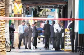  ?? Christina House Los Angeles Times ?? IN L.A., people with mental illnesses go through a revolving door of temporary psych units and jails. Above, police investigat­e a shooting on Hollywood Boulevard.