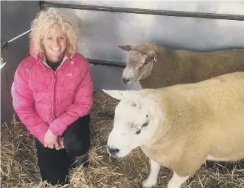  ??  ?? Judith Jacobs on her farm in Newborough.