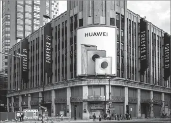  ?? / FOR CHINA DAILY WANG GANG ?? Huawei Technologi­es Co’s largest flagship store, which is undergoing renovation in Shanghai.