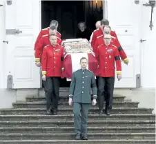  ?? LISELOTTE SABROE/THE ASSOCIATED PRESS ?? A casket carrying Denmark’s Prince Henrik is carried from Fredensbor­g Palace in Fredensbor­g, Denmark, on Thursday. Henrik died Tuesday at the age of 83.