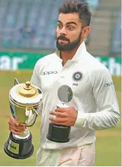  ?? — PTI ?? Virat Kohli with his spoils.